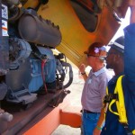 Student and instructor inspecting aerial lift